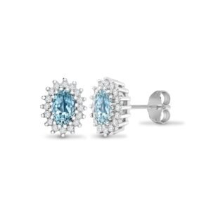 9E109 | 9ct white gold 25pt Natural Diamond and blue topaz stud earrings.