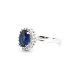 925 Silver Rhodium CZ Set Oval Cluster Sapphire Blue Centre