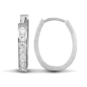 JER715 | 9ct white gold cubic zirconia set oval huggie earrings.